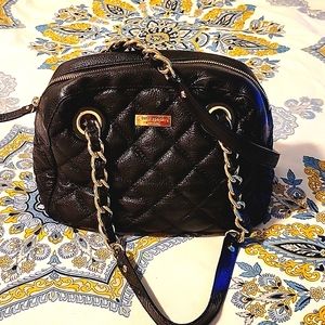 Classic Kate Spade fully lined quilted shoulder bag in black.Excellent condition